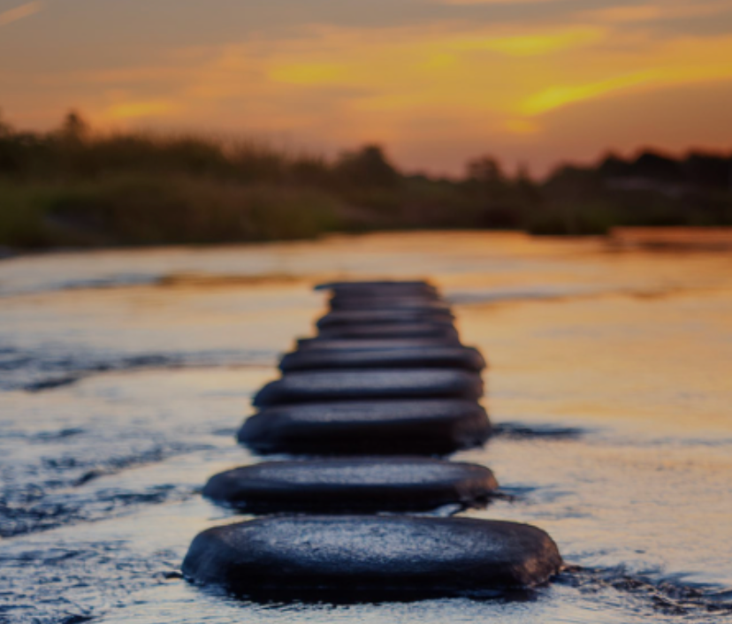 Stepping stones — a visual metaphor for clear, deliberate progress